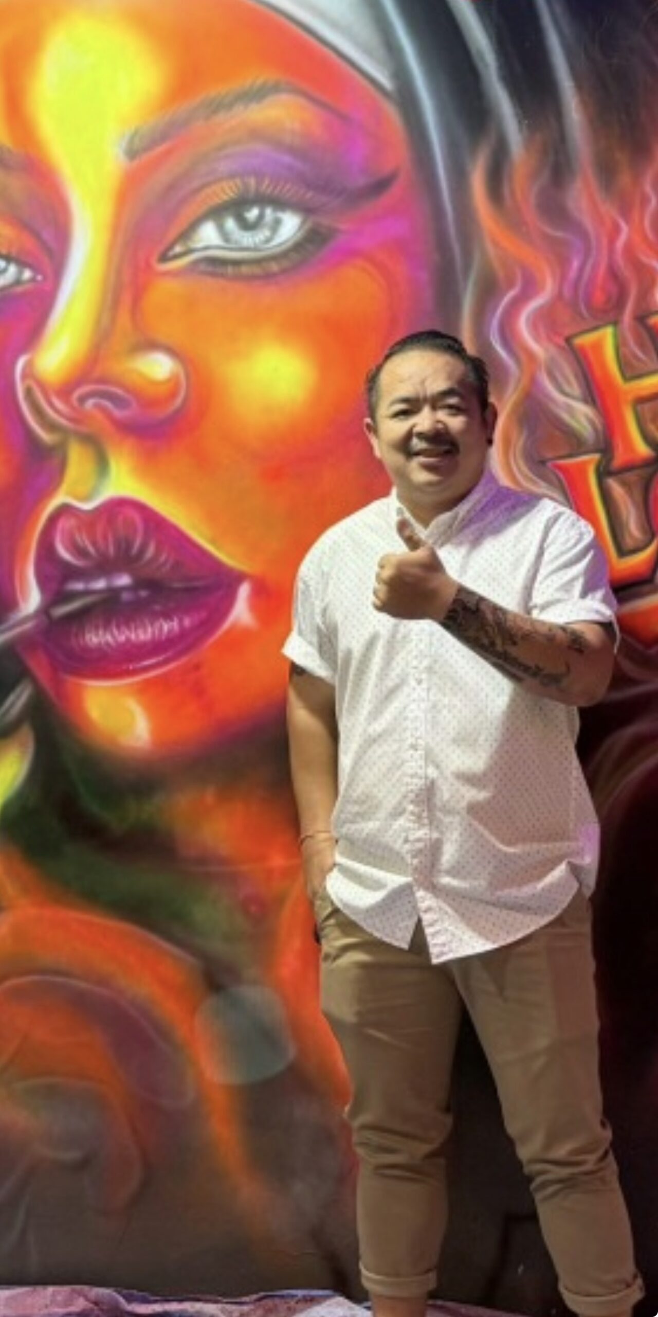 Kay, Serenity Uncovered’s first podcast guest, standing inside a Pattaya venue.